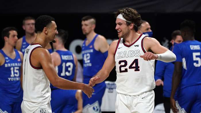 Jalen Suggs and Corey Kispert celebrate during the WCC tournament championship game.